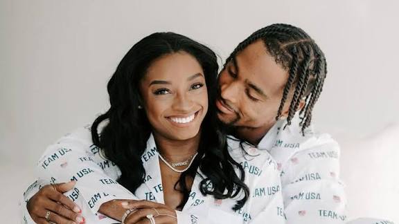 Just In...Simone Biles leaves onlookers blushing after sharing a steamy moment with Jonathan Owens