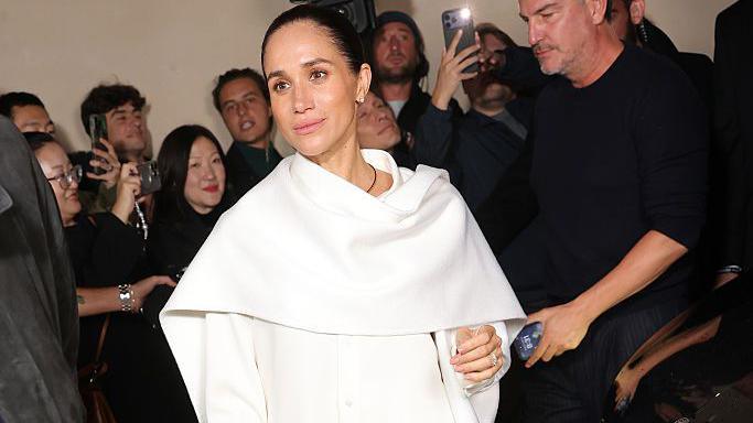 Check out Meghan Markles surprise appearance at Paris Fashion Week that is worth beholding